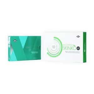 Two rectangular product packaging boxes are displayed against a white background. The left box is teal-colored and has "VISCODERM® SKINKÒ E" written on it. The right box is white and green with "VISCODERM® SKINKÒ KIT" text.