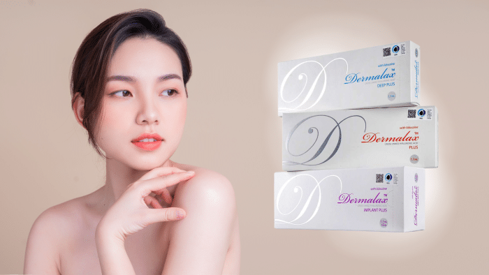 A young woman with clear skin poses against a beige background, gently touching her shoulder with a serene expression. To her right, three stacked boxes of Dermalax skincare products are displayed, each in white packaging with distinct labels: Deep Plus, Plus, and Implant Plus. Curious about how long Dermalax filler lasts?
