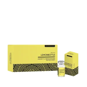 A yellow skincare product set includes a rectangular box, a smaller box, and a small vial. Both boxes have bold, black text that reads "LEMONBOTTLE AMPOULE SOLUTION 10ml" and a zebra-like black stripe pattern at the bottom. The vial has a silver cap with similar branding.