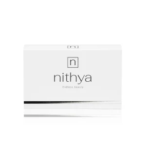 A minimalistic white box for a product named "NITHYA ENDLESS BEAUTY" with the tagline "Endless beauty" underneath. The design includes a simple black outline of a square with an "n" inside and a thin silvery line near the bottom edge.