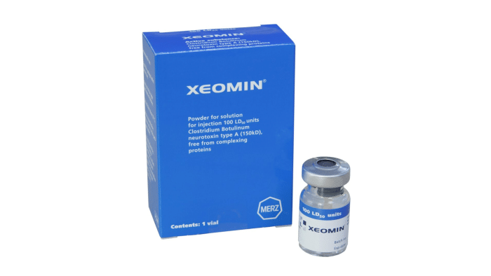 Image of a blue box labeled "Xeomin" and a small clear vial beside it. The box and vial both display the text "Xeomin," indicating it's a powder for solution containing 100 LD50 units of Clostridium Botulinum neurotoxin type A, free from complexing proteins. Wondering, is Xeomin safe? Consult your doctor for more information.