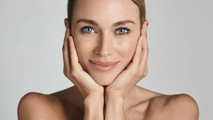 A woman with rejuvenated and healthy-looking skin.